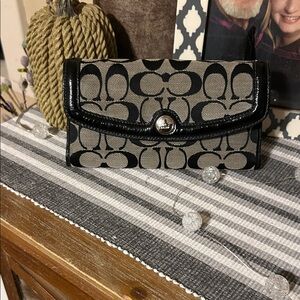 Coach Black and Tan Signature Wallet with Patent Trim and check book holder
